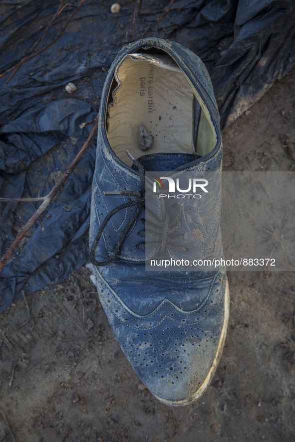 Blue leather Pierre Cardin wingtip shoe found near Eftalou on the island of Lesbos.  Shoes found on the beaches and around the Greek island...