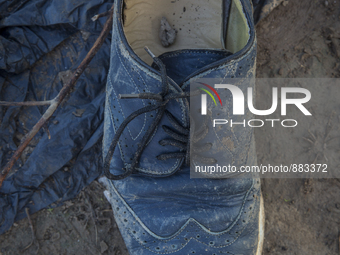 Blue leather Pierre Cardin wingtip shoe found near Eftalou on the island of Lesbos.  Shoes found on the beaches and around the Greek island...