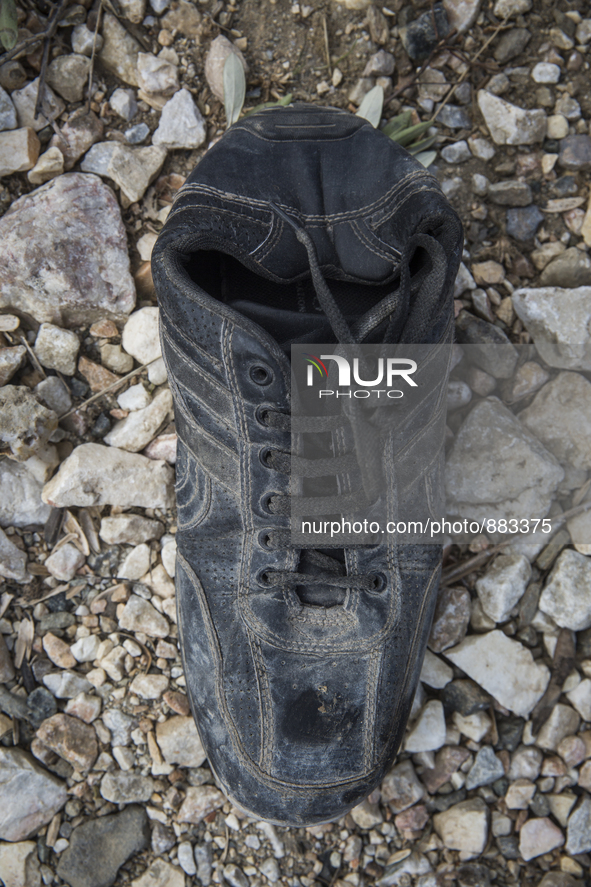 Men's leather shoe, found at the edge of Moria Camp, where immigrants must register with Greek authorities on the island of Lesbos, Greece....