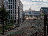 The U.S. Capitol is seen beyond commuter and freight railway tracks in Washington, D.C. on September 14, 2022 as a potential nationwide labo...