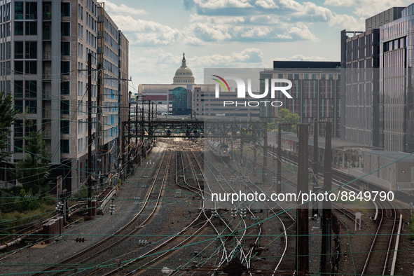 The U.S. Capitol is seen beyond commuter and freight railway tracks in Washington, D.C. on September 14, 2022 as a potential nationwide labo...