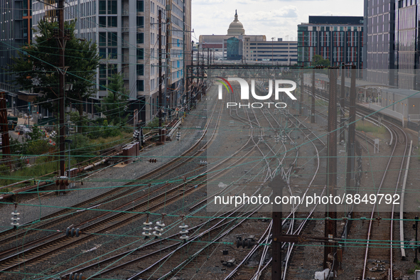 The U.S. Capitol is seen beyond commuter and freight railway tracks in Washington, D.C. on September 14, 2022 as a potential nationwide labo...