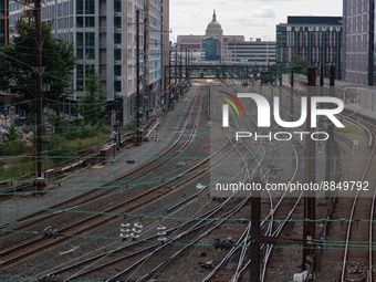 The U.S. Capitol is seen beyond commuter and freight railway tracks in Washington, D.C. on September 14, 2022 as a potential nationwide labo...