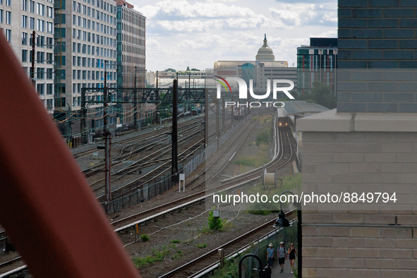 The U.S. Capitol is seen beyond commuter and freight railway tracks in Washington, D.C. on September 14, 2022 as a potential nationwide labo...