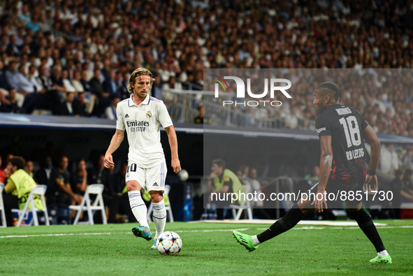 Luka Modric and Christopher Nkunku during UEFA Champions League match between Real Madrid and RB Leipzig at Estadio Santiago Bernabeu on Sep...