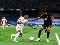 Rodrygo and Abdou Diallo during UEFA Champions League match between Real Madrid and RB Leipzig at Estadio Santiago Bernabeu on September 14,...