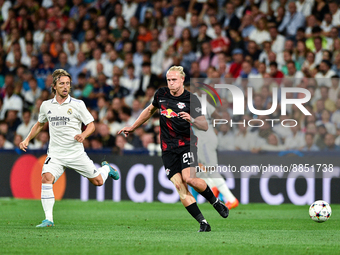 Xaver Schlager and Luka Modric during UEFA Champions League match between Real Madrid and RB Leipzig at Estadio Santiago Bernabeu on Septemb...