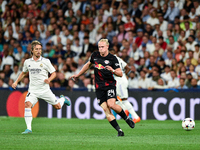 Xaver Schlager and Luka Modric during UEFA Champions League match between Real Madrid and RB Leipzig at Estadio Santiago Bernabeu on Septemb...