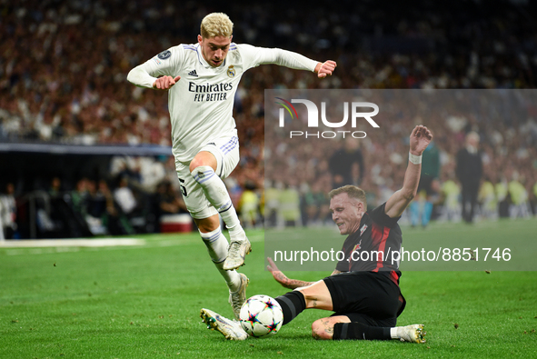 Federico Valverde and Willi Orban during UEFA Champions League match between Real Madrid and RB Leipzig at Estadio Santiago Bernabeu on Sept...