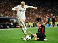 Federico Valverde and Willi Orban during UEFA Champions League match between Real Madrid and RB Leipzig at Estadio Santiago Bernabeu on Sept...