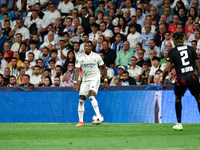 David Alaba and Mohamed Simakan during UEFA Champions League match between Real Madrid and RB Leipzig at Estadio Santiago Bernabeu on Septem...