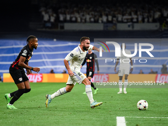 Daniel Carvajal and Christopher Nkunku during UEFA Champions League match between Real Madrid and RB Leipzig at Estadio Santiago Bernabeu on...