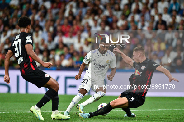 Rodrygo, Willi Orban and Abdou Diallo during UEFA Champions League match between Real Madrid and RB Leipzig at Estadio Santiago Bernabeu on...