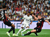 Rodrygo, Willi Orban and Abdou Diallo during UEFA Champions League match between Real Madrid and RB Leipzig at Estadio Santiago Bernabeu on...