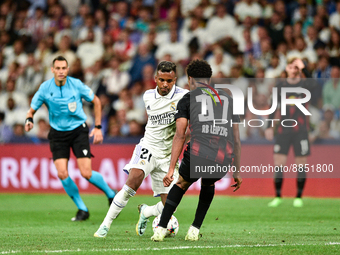 Rodrygo and Abdou Diallo during UEFA Champions League match between Real Madrid and RB Leipzig at Estadio Santiago Bernabeu on September 14,...