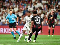 Rodrygo and Abdou Diallo during UEFA Champions League match between Real Madrid and RB Leipzig at Estadio Santiago Bernabeu on September 14,...