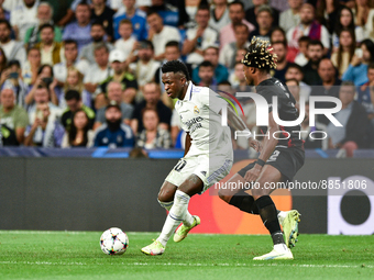 Vinicius Junior and Mohamed Simakan during UEFA Champions League match between Real Madrid and RB Leipzig at Estadio Santiago Bernabeu on Se...