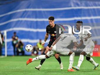 Dominik Szoboszlai, David Alaba and Eduardo Camavinga during UEFA Champions League match between Real Madrid and RB Leipzig at Estadio Santi...