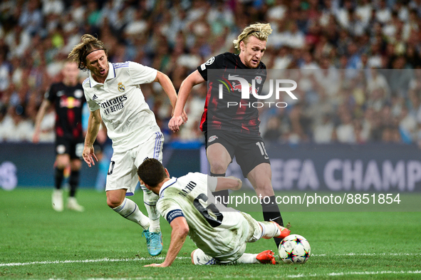 Emil Forsberg, Nacho and Luka Modric during UEFA Champions League match between Real Madrid and RB Leipzig at Estadio Santiago Bernabeu on S...