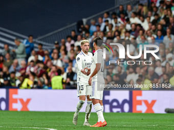 Marco Asensio and Federico Valverde celebrates a goal during UEFA Champions League match between Real Madrid and RB Leipzig at Estadio Santi...