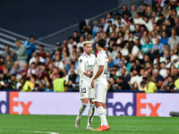 Marco Asensio and Federico Valverde celebrates a goal during UEFA Champions League match between Real Madrid and RB Leipzig at Estadio Santi...