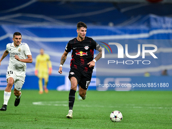 Dominik Szoboszlai and Dani Ceballos during UEFA Champions League match between Real Madrid and RB Leipzig at Estadio Santiago Bernabeu on S...