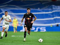 Dominik Szoboszlai and Dani Ceballos during UEFA Champions League match between Real Madrid and RB Leipzig at Estadio Santiago Bernabeu on S...