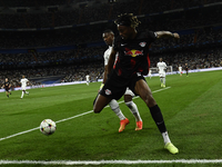 Mohamed Simakan centre-back of RB Leipzig and Franceand David Alaba centre-back of Real Madrid and Austria compete for the ball during the U...