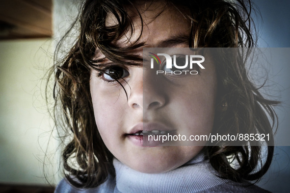 A Syrian girl in a Hotel in Kos, on November 1, 2015. Many Syrians living around the Island of Kos Greece in hotels as the tourist season en...