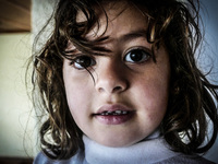 A Syrian girl in a Hotel in Kos, on November 1, 2015. Many Syrians living around the Island of Kos Greece in hotels as the tourist season en...