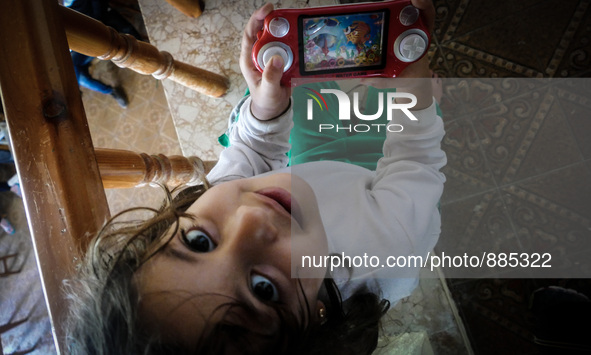 A Syrian girl in a Hotel in Kos, on November 1, 2015. Many Syrians living around the Island of Kos Greece in hotels as the tourist season en...