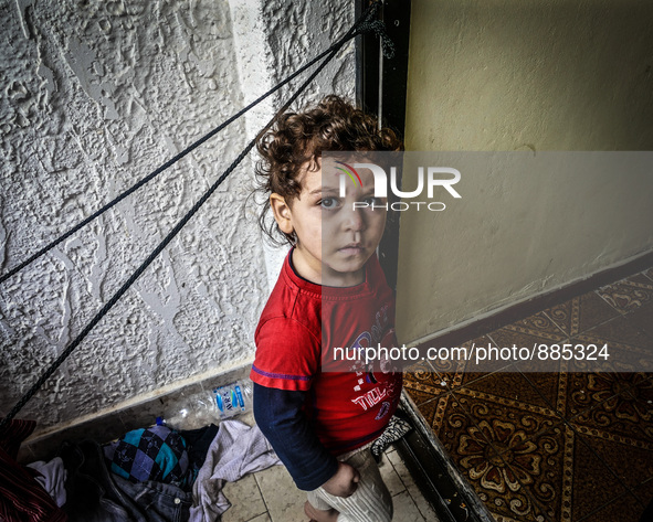 A Syrian boy in a Hotel in Kos, on November 1, 2015. Many Syrians living around the Island of Kos Greece in hotels as the tourist season end...