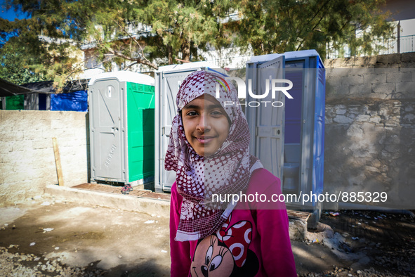 A child in Leros Refugee Camp, on October 30, 2015. Refugee camp Leros, located on the Greek Island of Leros is a transit camp for refugees...