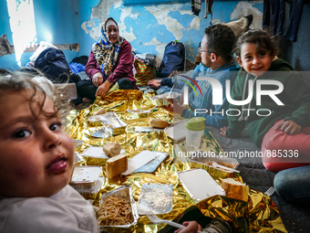 A family in Leros Refugee Camp, Greece, on October 30, 2015. Refugee camp Leros, located on the Greek Island of Leros is a transit camp for...
