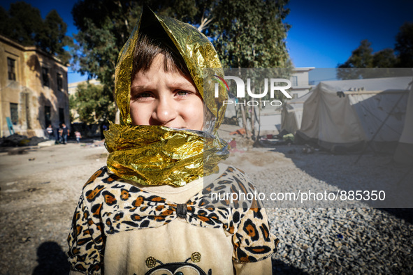 A child in Leros Refugee Camp, on October 30, 2015. Refugee camp Leros, located on the Greek Island of Leros is a transit camp for refugees...