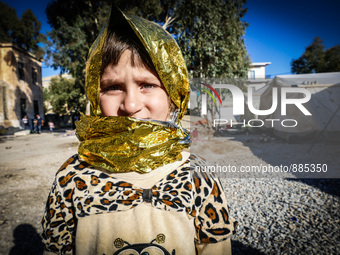 A child in Leros Refugee Camp, on October 30, 2015. Refugee camp Leros, located on the Greek Island of Leros is a transit camp for refugees...