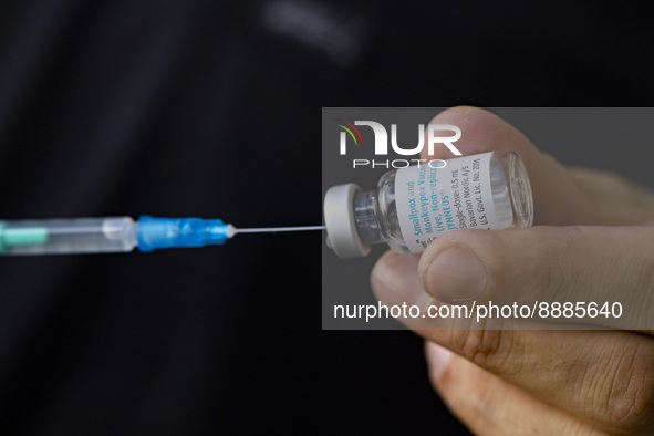 Medical personnel prepares a syringe with the vaccine against smallpox and monkeypox at Checkpoint Bln in Berlin, Germany on September 16, 2...