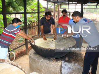   Social worker Nitesh Khandelwal and his team members  prepare ayurvedic medicine for cows after lumpy skin disease  outbreak in cattle, at...