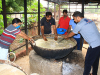   Social worker Nitesh Khandelwal and his team members  prepare ayurvedic medicine for cows after lumpy skin disease  outbreak in cattle, at...