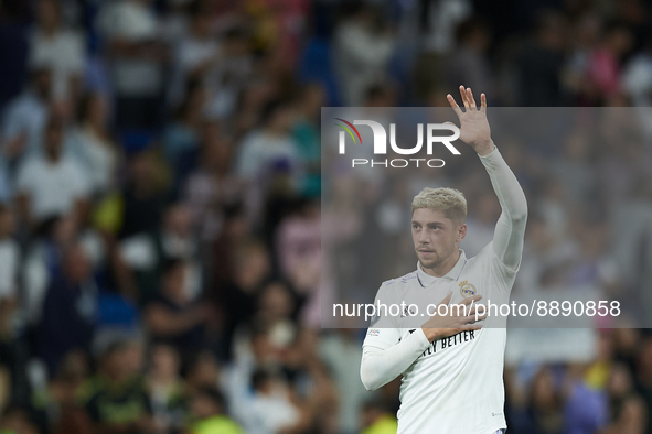 Federico Valverde central midfield of Real Madrid and Uruguay celebrates victory after the UEFA Champions League group F match between Real...