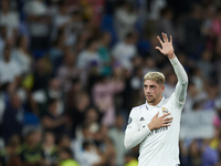 Federico Valverde central midfield of Real Madrid and Uruguay celebrates victory after the UEFA Champions League group F match between Real...