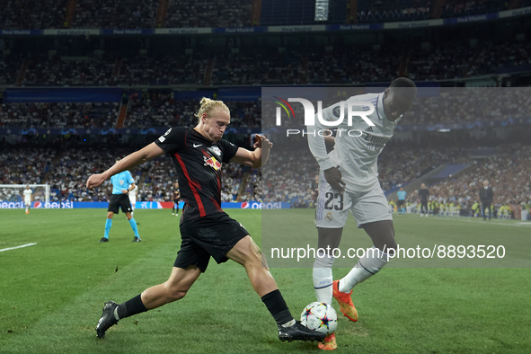 Xaver Schlager central midfield of RB Leipzig and Austria and Ferland Mendy left-back of Real Madrid and France compete for the ball during...