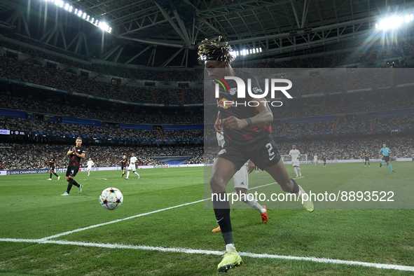 David Alaba centre-back of Real Madrid and Austria and Mohamed Simakan centre-back of RB Leipzig and France compete for the ball during the...