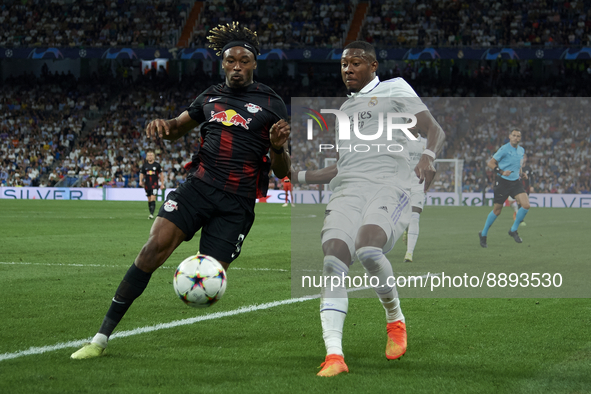 David Alaba centre-back of Real Madrid and Austria and Mohamed Simakan centre-back of RB Leipzig and France compete for the ball during the...