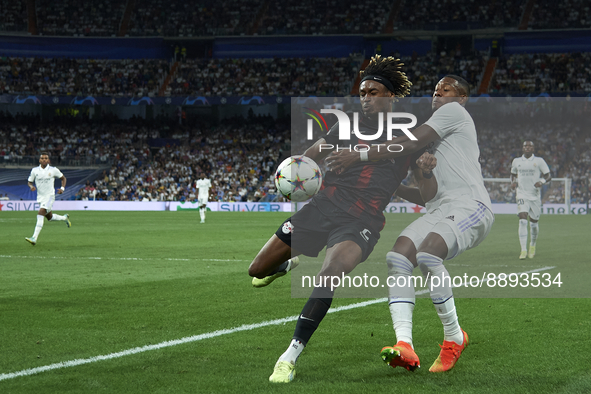 David Alaba centre-back of Real Madrid and Austria and Mohamed Simakan centre-back of RB Leipzig and France compete for the ball during the...