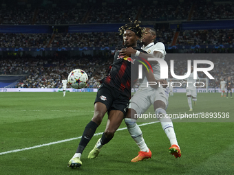 David Alaba centre-back of Real Madrid and Austria and Mohamed Simakan centre-back of RB Leipzig and France compete for the ball during the...