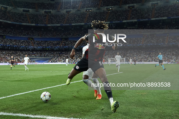 David Alaba centre-back of Real Madrid and Austria and Mohamed Simakan centre-back of RB Leipzig and France compete for the ball during the...