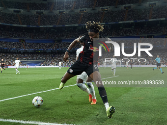 David Alaba centre-back of Real Madrid and Austria and Mohamed Simakan centre-back of RB Leipzig and France compete for the ball during the...