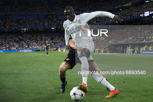 Xaver Schlager central midfield of RB Leipzig and Austria and Ferland Mendy left-back of Real Madrid and France compete for the ball during...