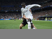 Xaver Schlager central midfield of RB Leipzig and Austria and Ferland Mendy left-back of Real Madrid and France compete for the ball during...